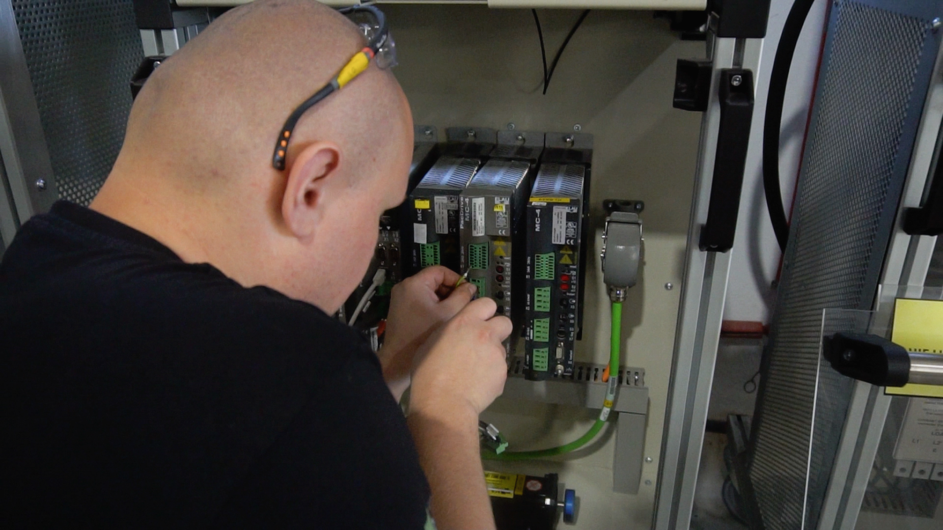 Service technician tests servo drive
